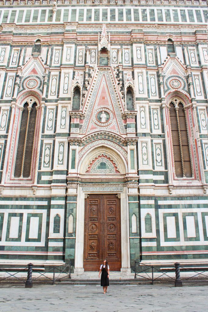 girl walking in front of santa maria del fiore