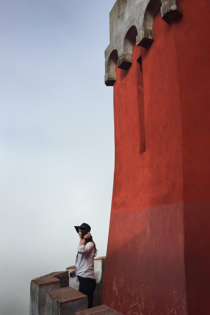 girl standing looking out from pena palace