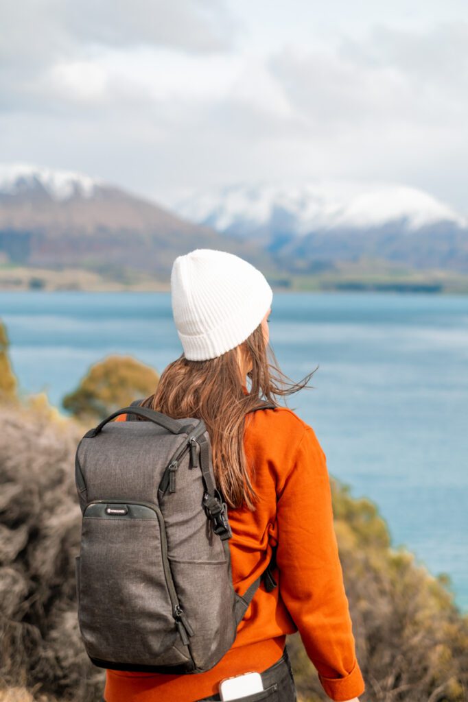 girl standing in front of mountains with Vanguard Vesta Aspire 41 Camera Bag