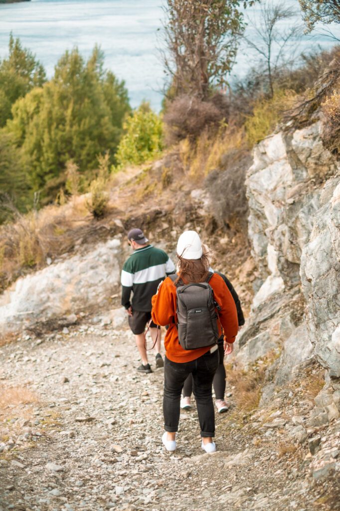 group of friends walking with a Vanguard Vesta Aspire 41 Camera Bag